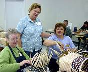 Kay Cooney, Miss Jimmie, & Becki Newsome working on a chairside basket