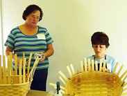Pam Mullis & Chris Bragman weaving Jenny's Day Out basket,taught by Mavis Fairchild